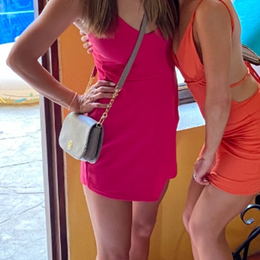 Super cute hot pink Misguided skort romper, size 4.
